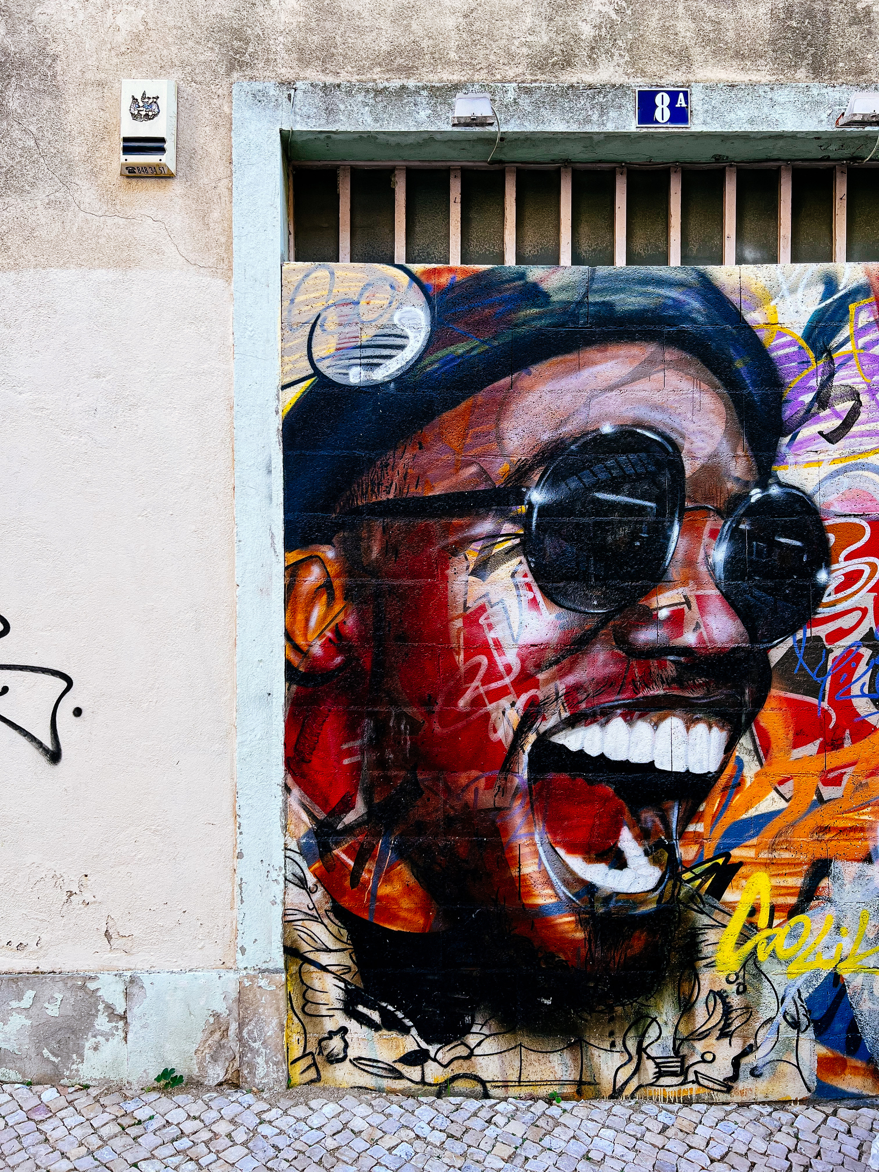 Street art, graffiti of a man yelling/singing 