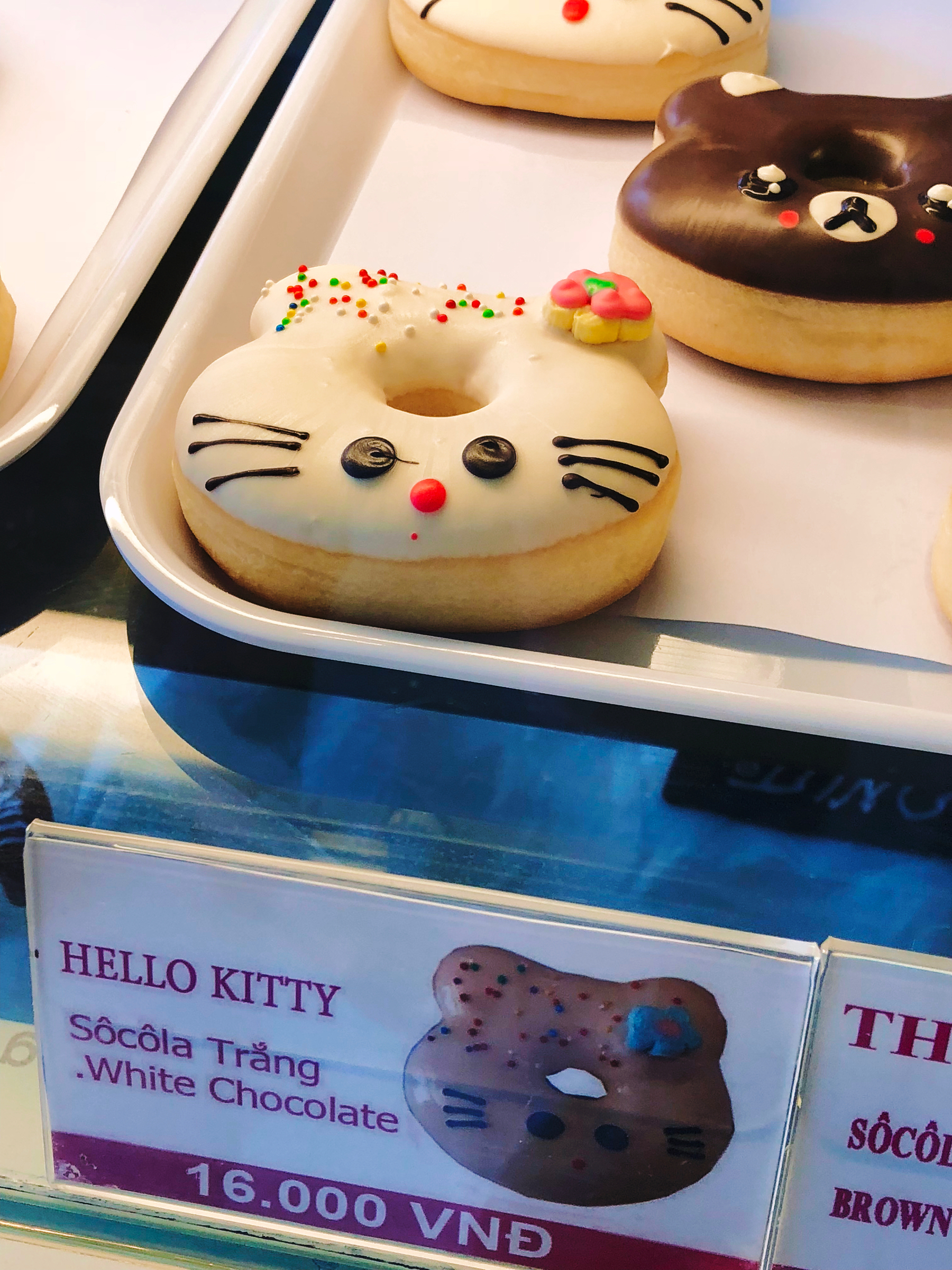 A white chocolate Hello Kitty doughnut 