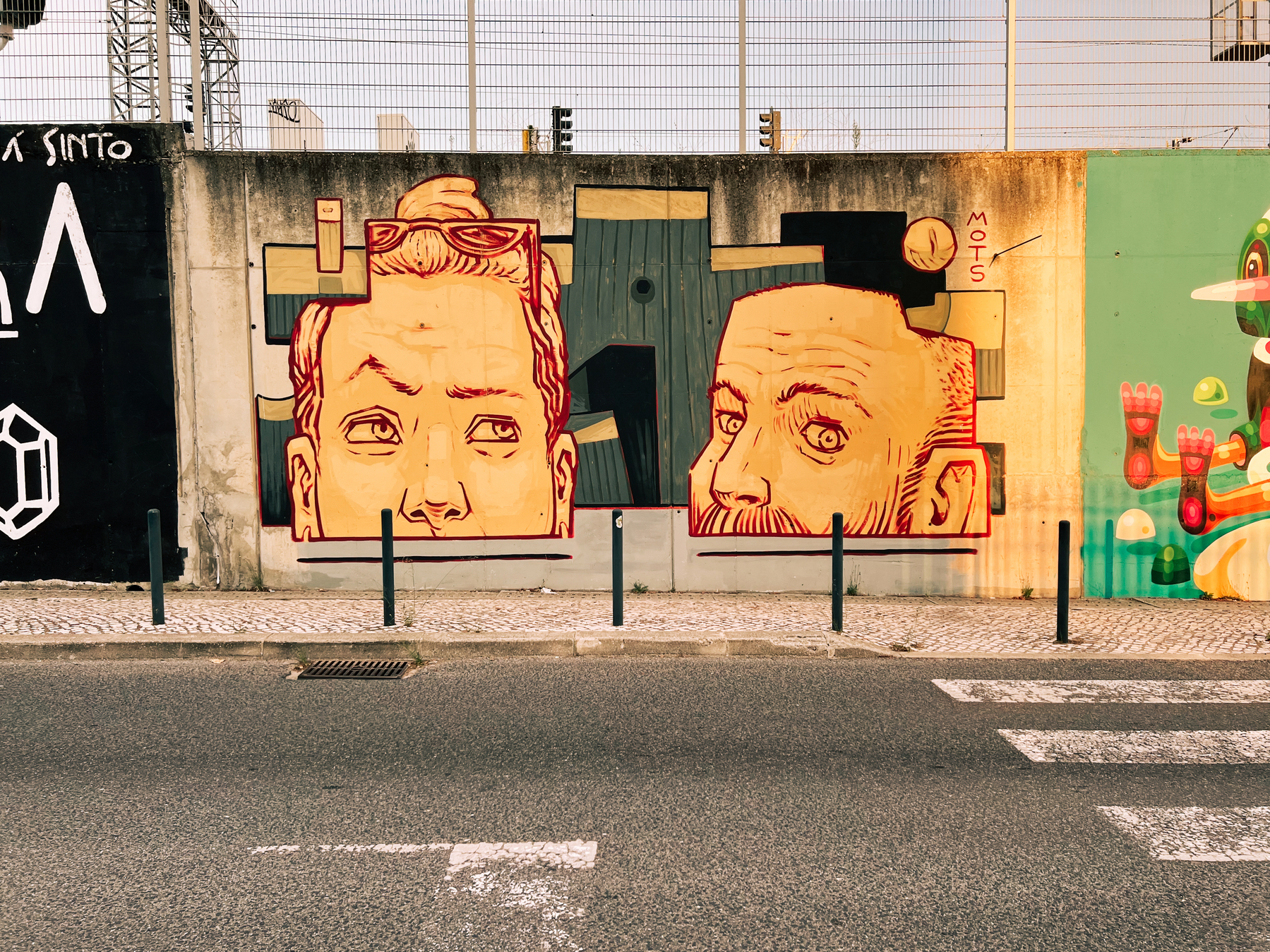 Street art. Two portraits side by side.