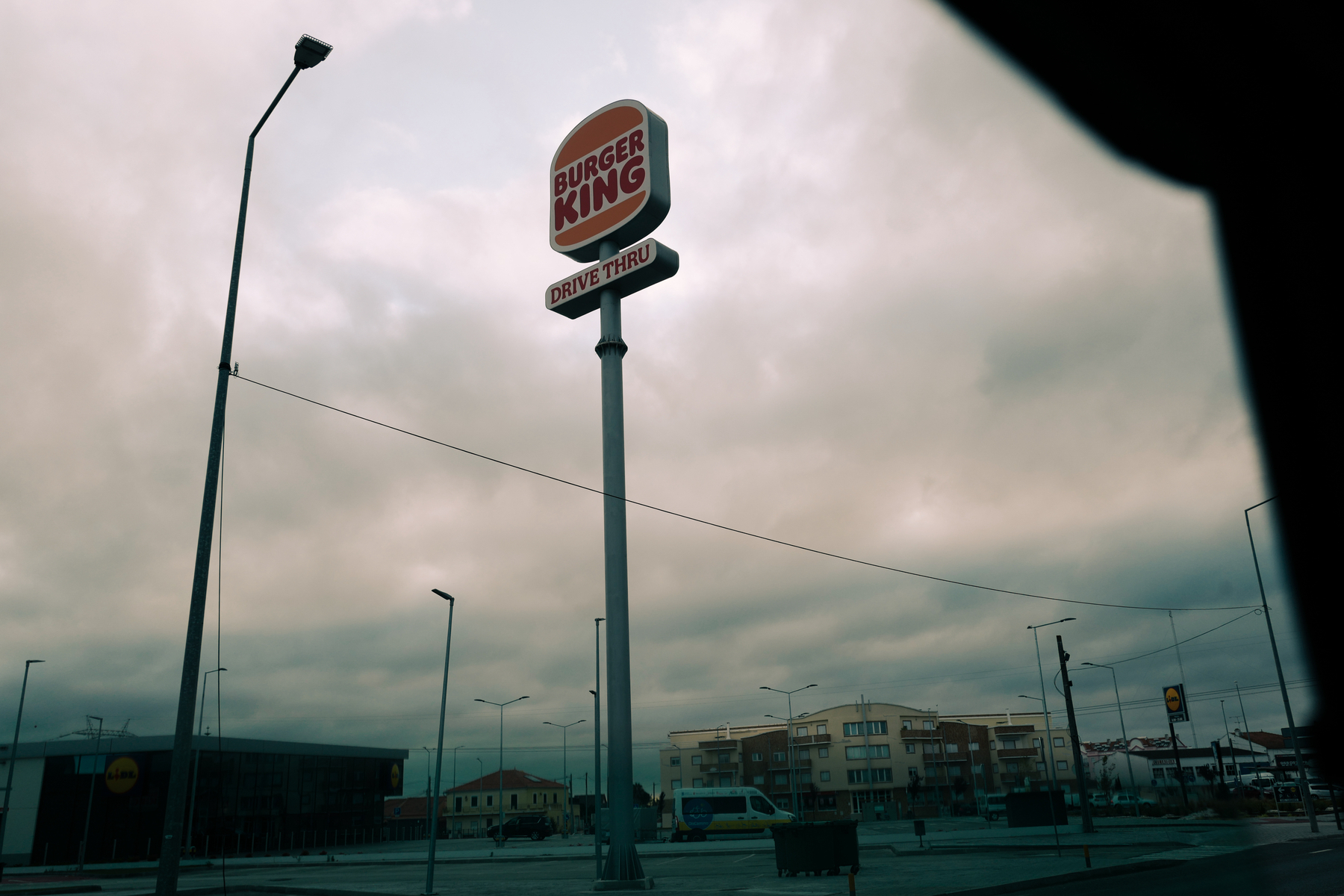 A Burger King sign in the middle of nowhere. 