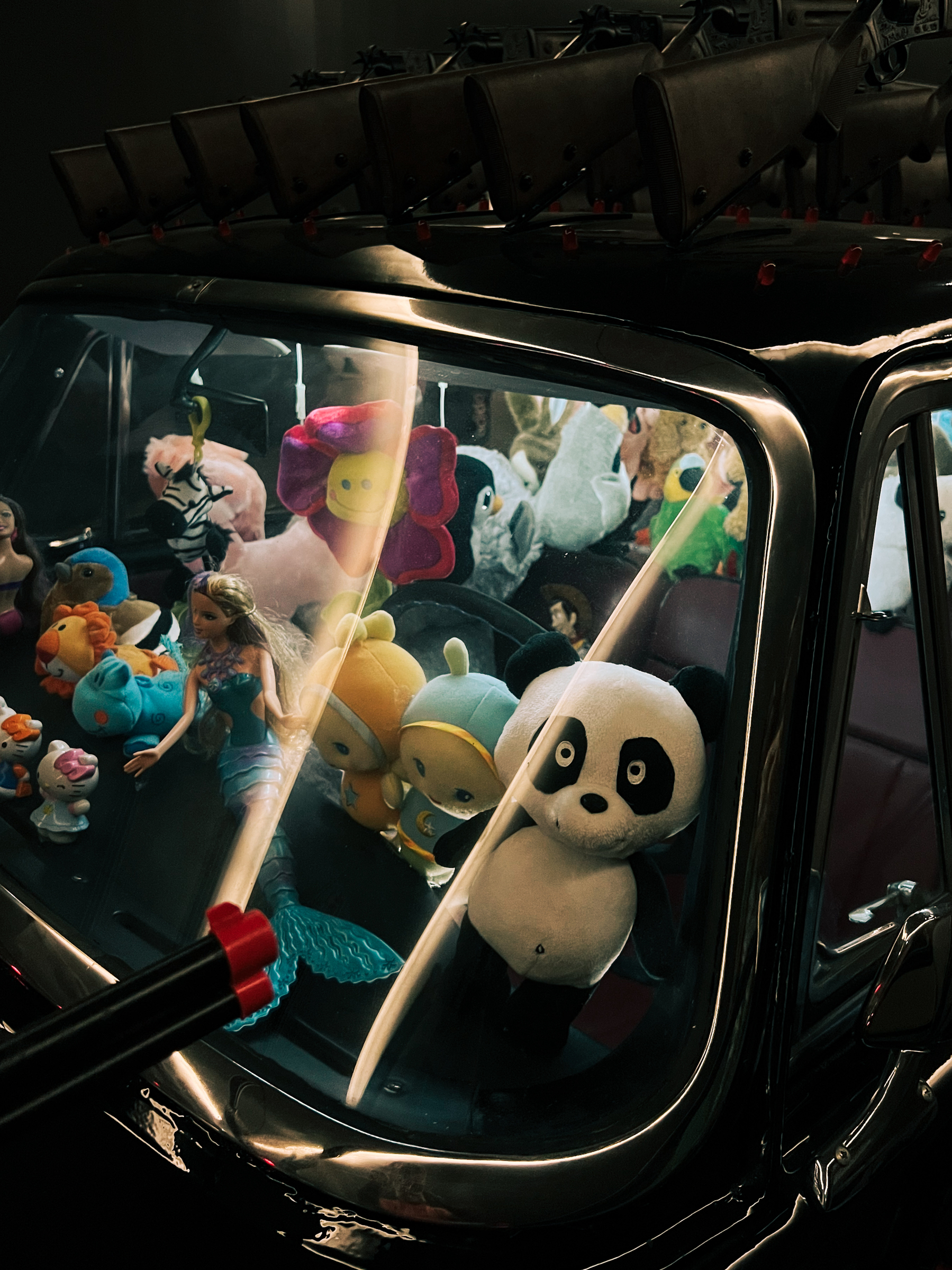 Art work by Joana Vasconcelos. Plush toys inside a car. 