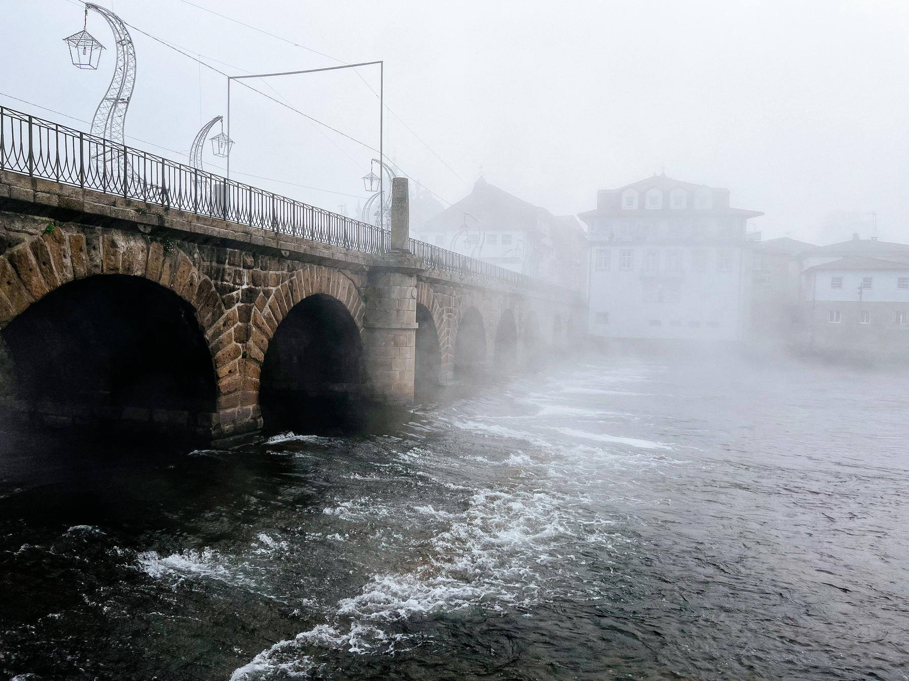 Foggy. Water under a bridge. 