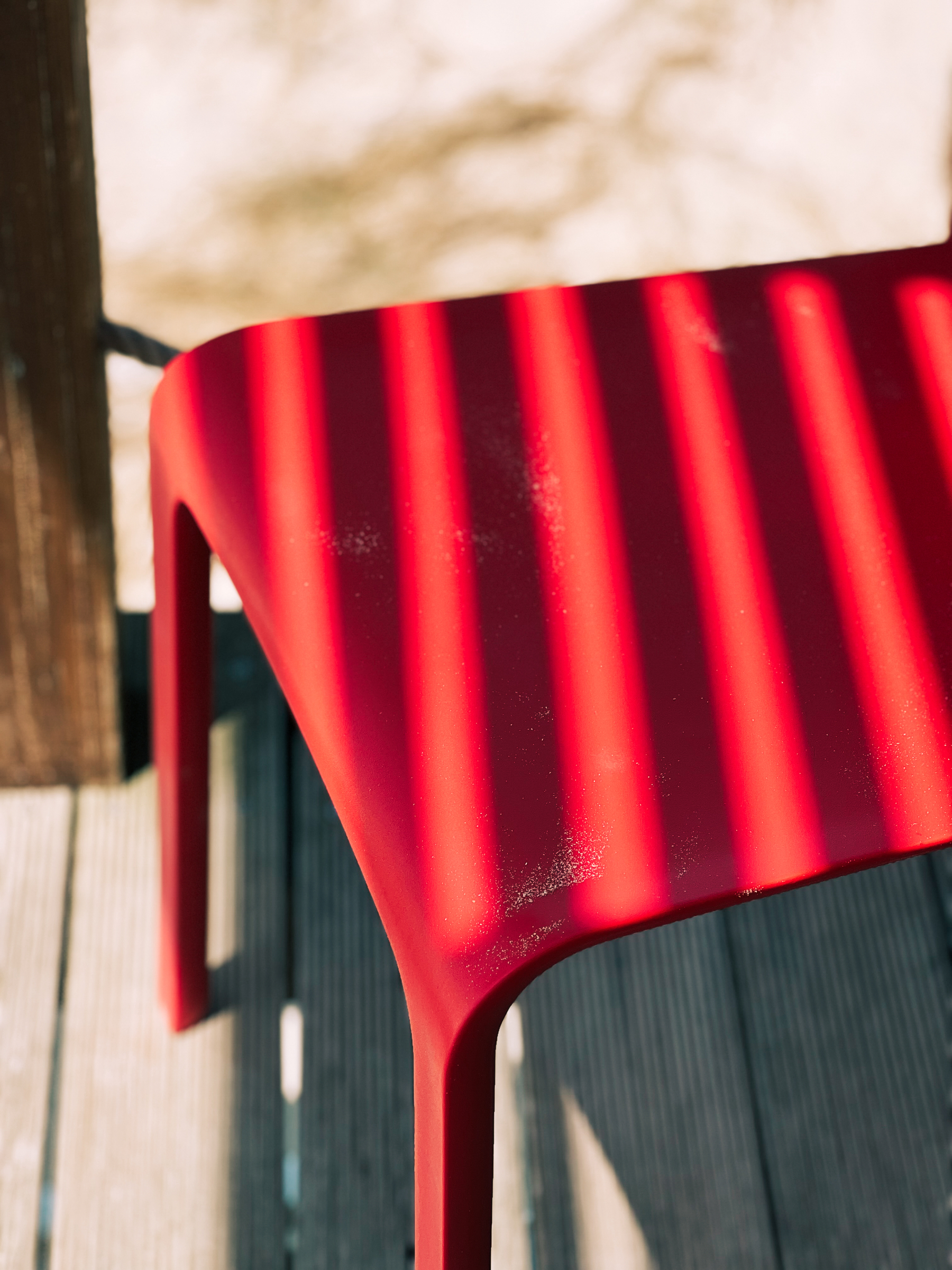Shadows on a red chair. 