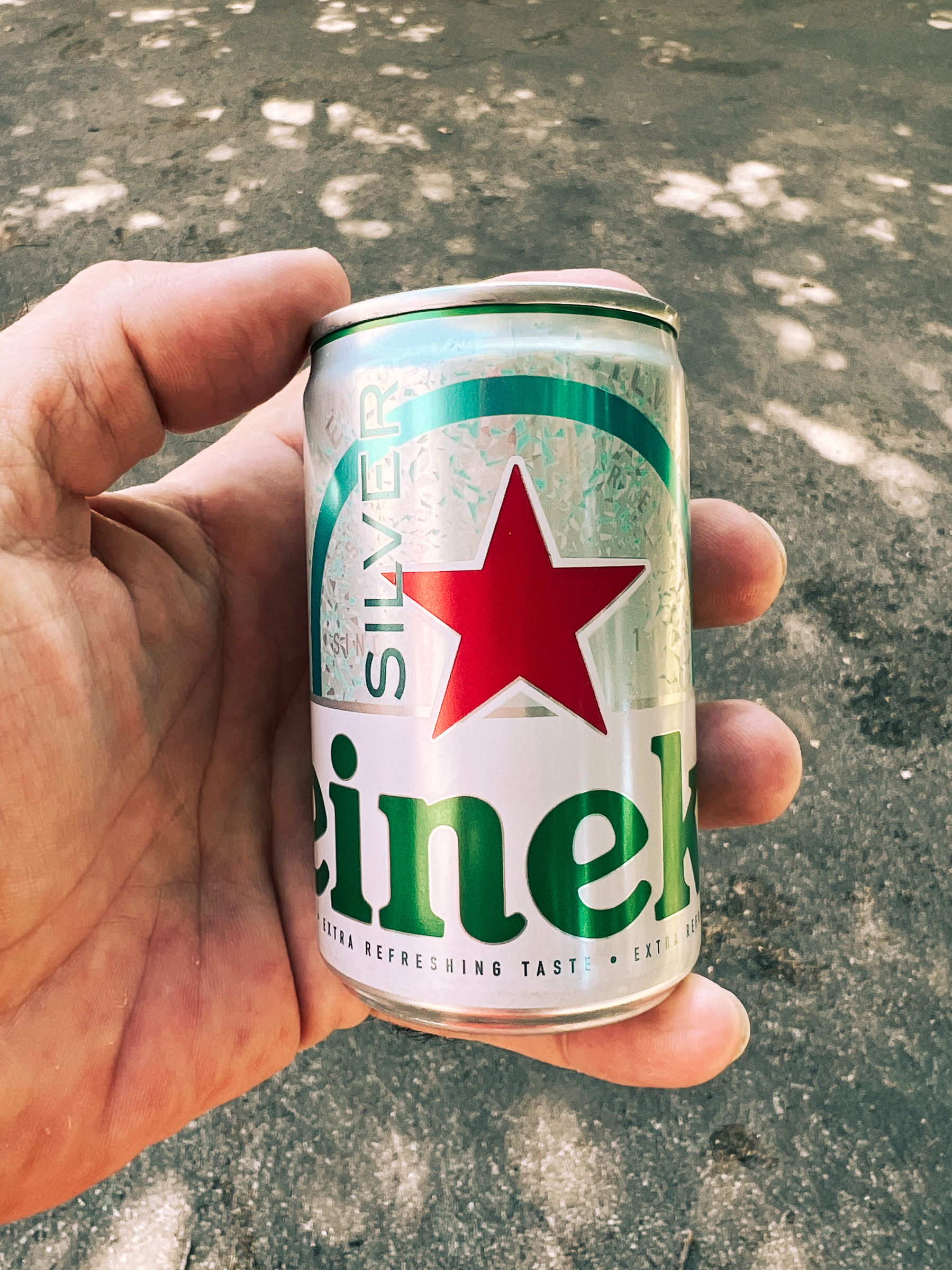 A tiny Heineken can. 