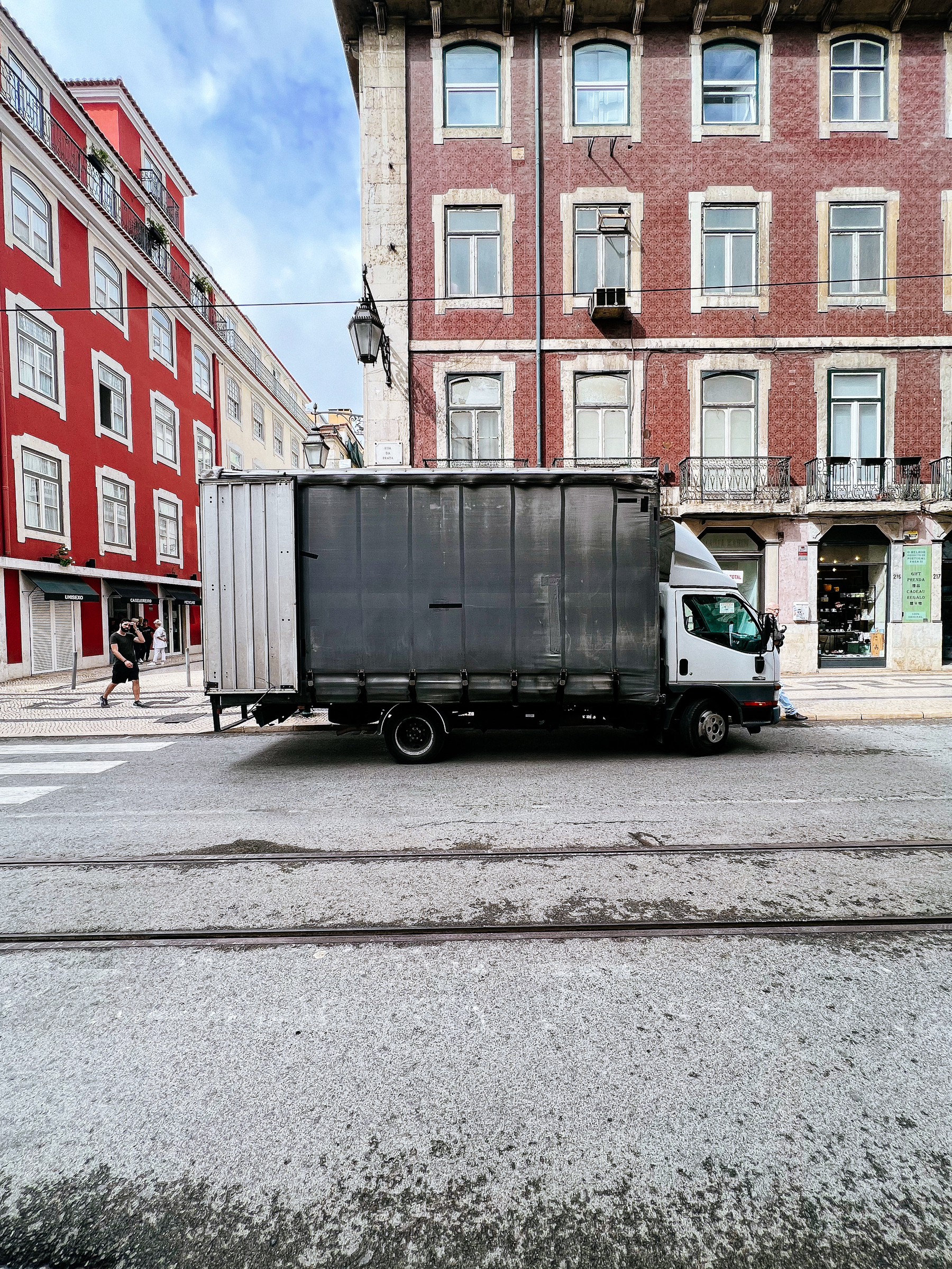 A truck is parked in a street.