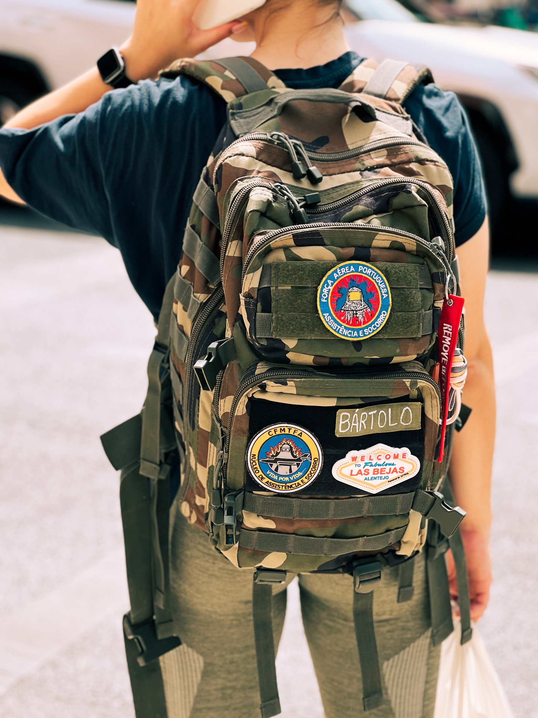 A backpack with badges. 