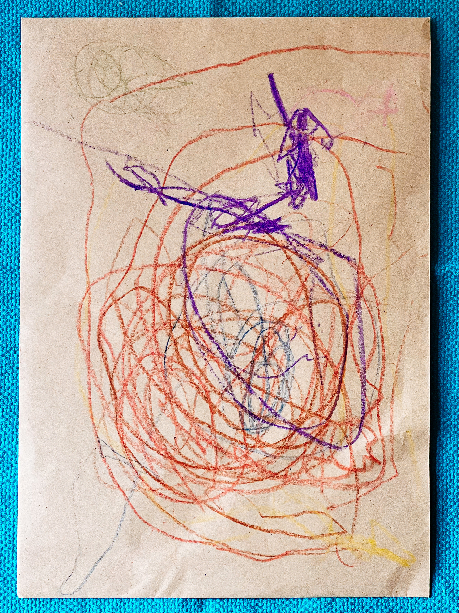 An envelope with children’s drawing. 