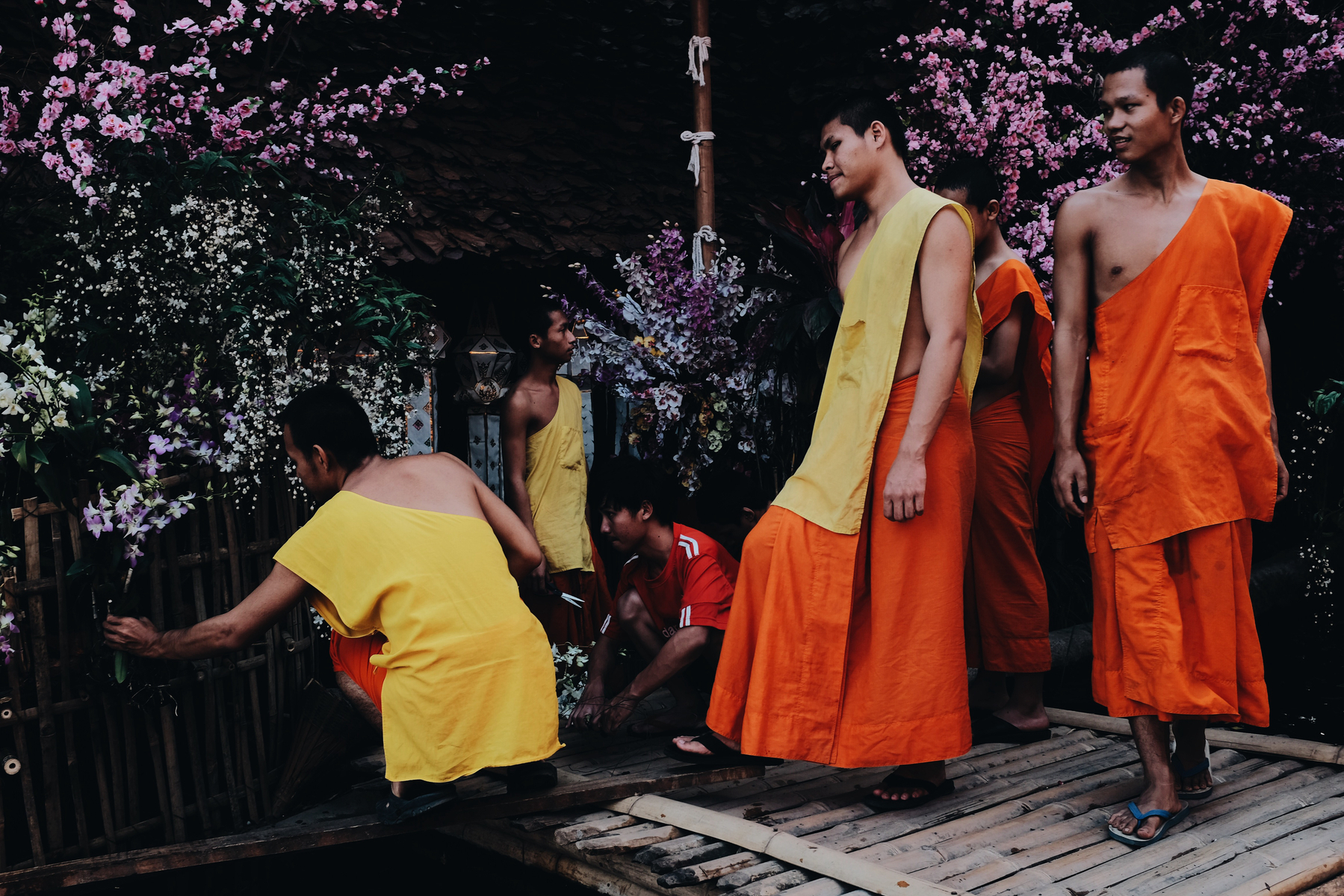 Monks take care of a garden.