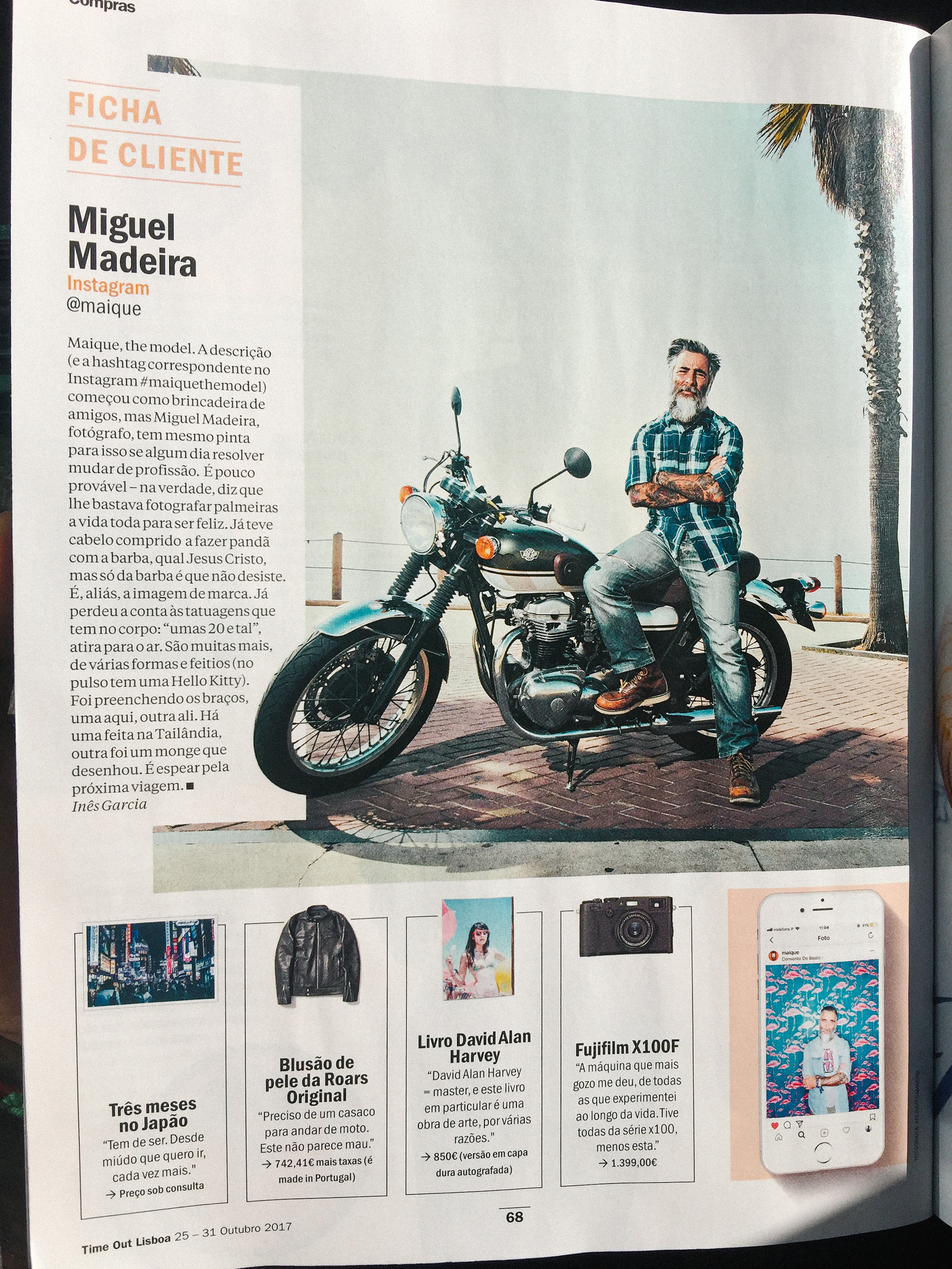 a magazine page, with a man sitting on a motorcycle.
