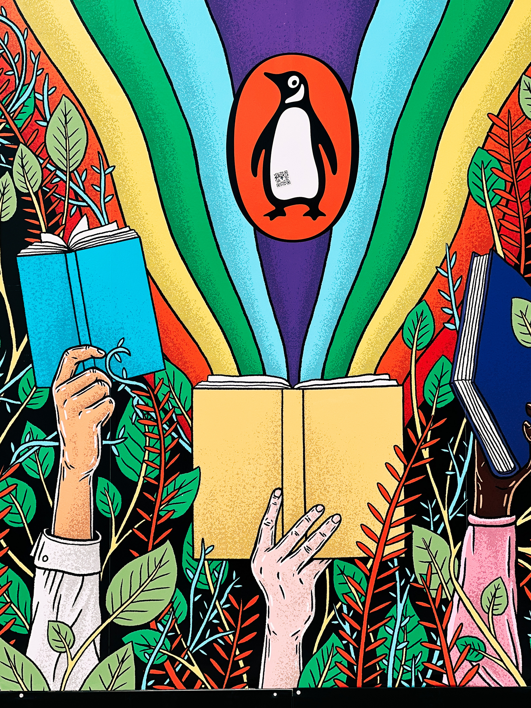 Illustration with hands holding books, and the Penguin publisher logo on top. 