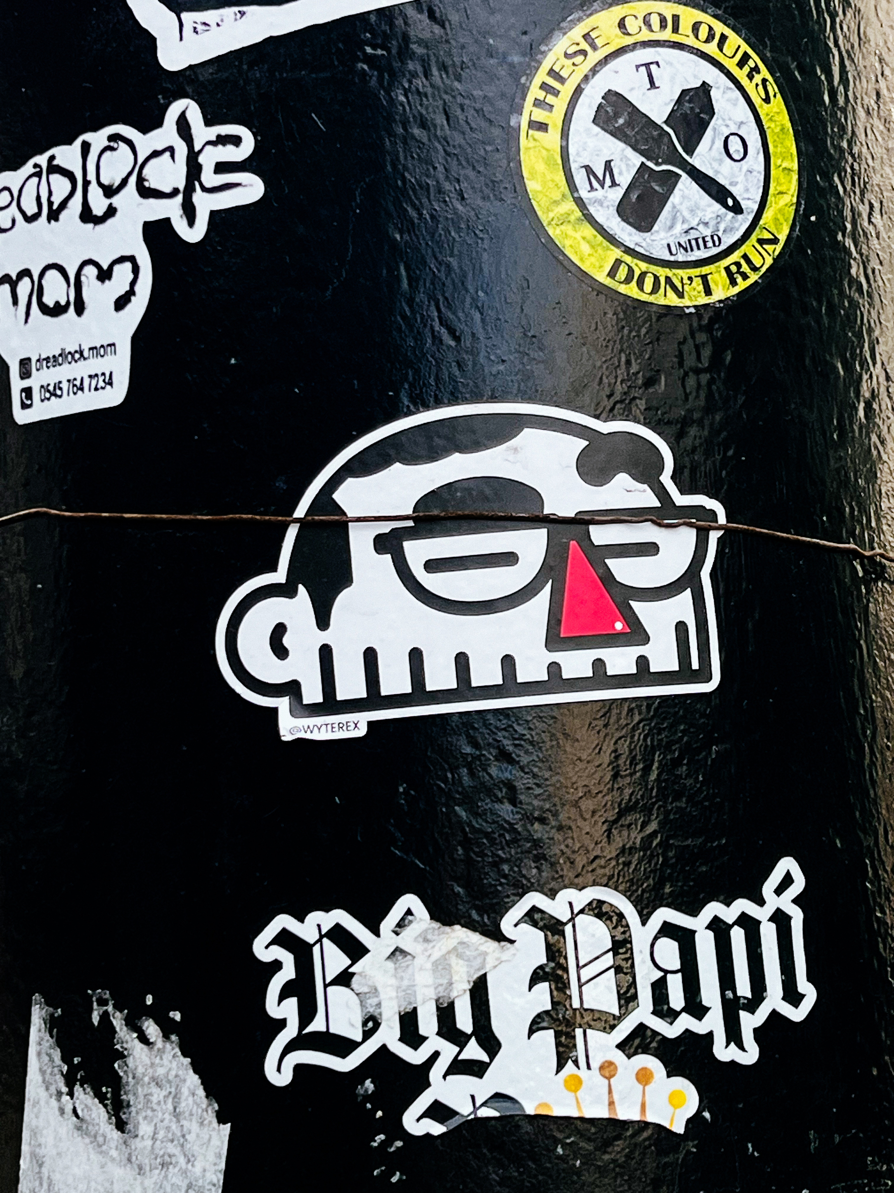 Several sticker. One says “Big Papi”, another a cute cartoony face. 